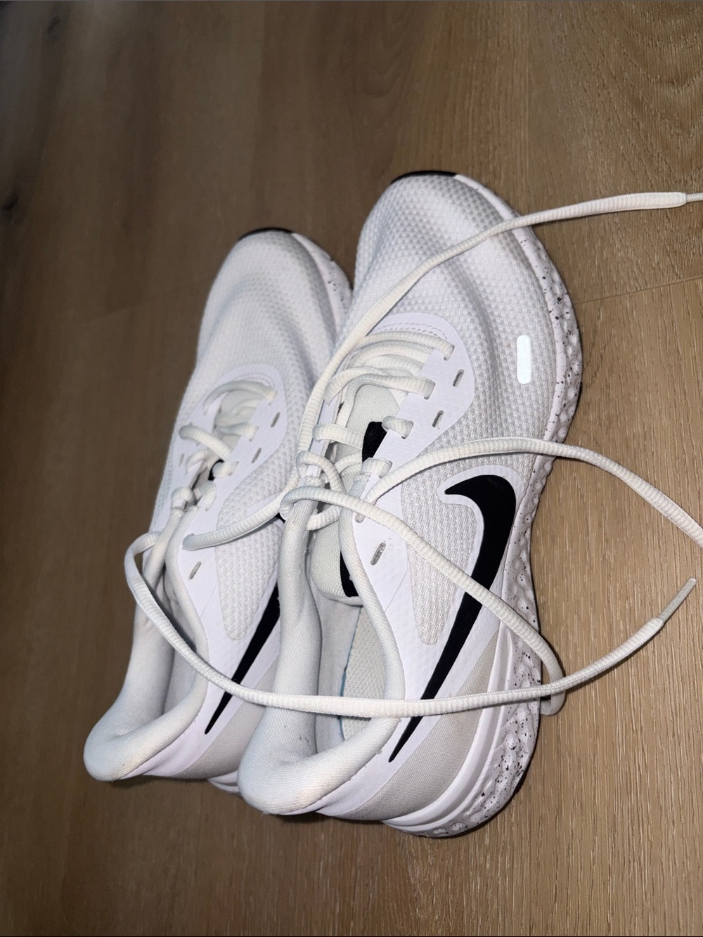 Nike White Athletic Running Shoes with Black Swoosh